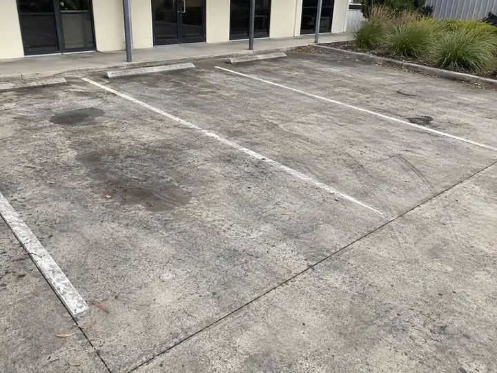 Commercial car park in brisbane before pressure cleaning