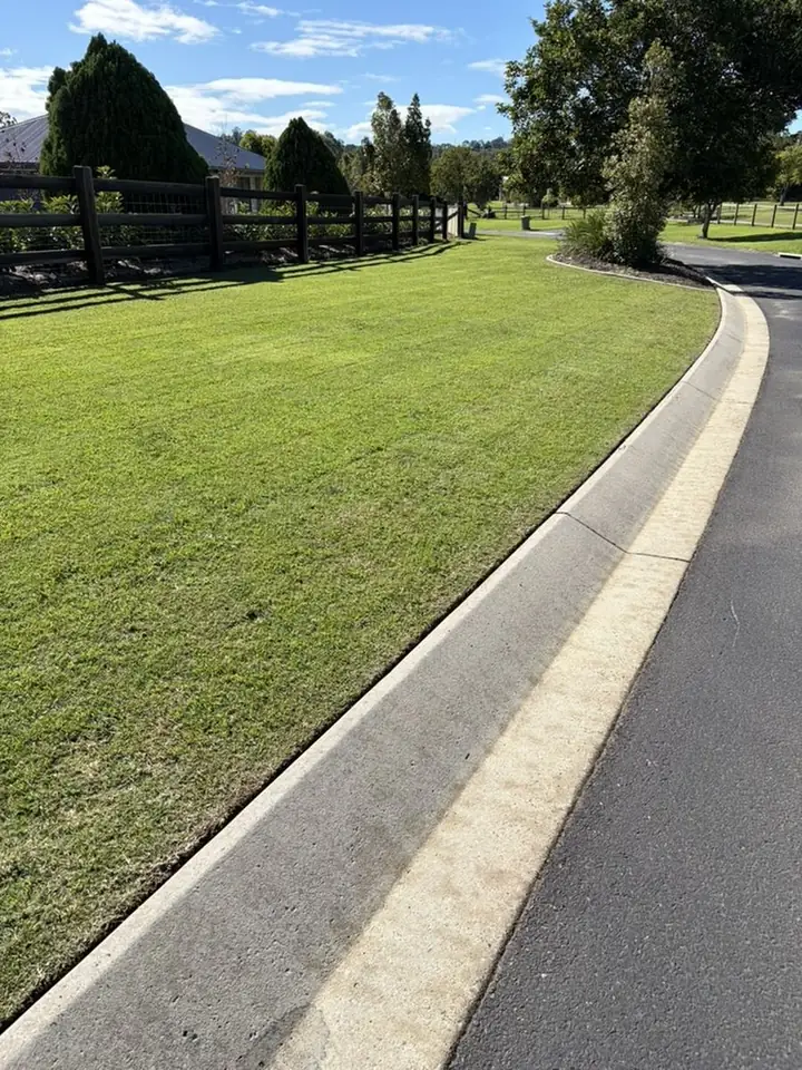 Concrete kerb and gutter in brisbane after pressure cleaning