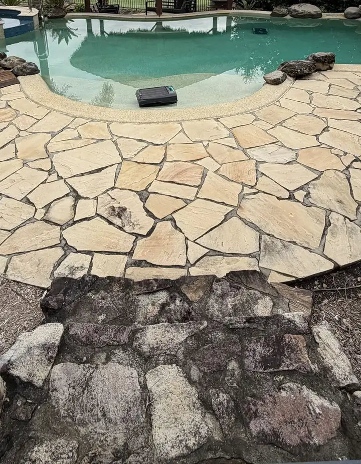Sandstone pool surround and steps in brisbane before cleaning